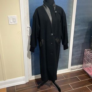 Black trench coat trimmed in genuine leather